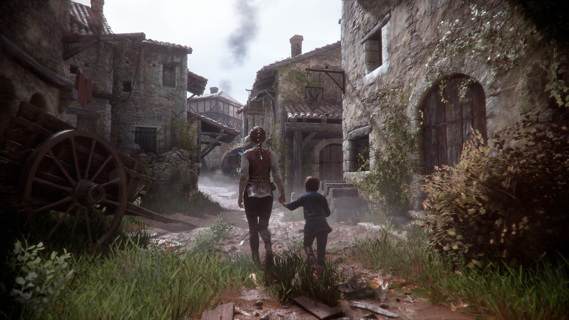 Amicia and Hugo walk through a weathered village.