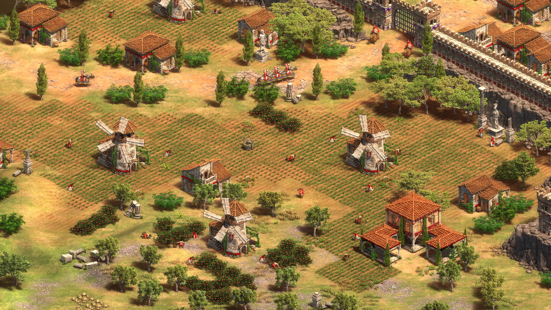 Farms, windmills and defensive walls surround a developed settlement.