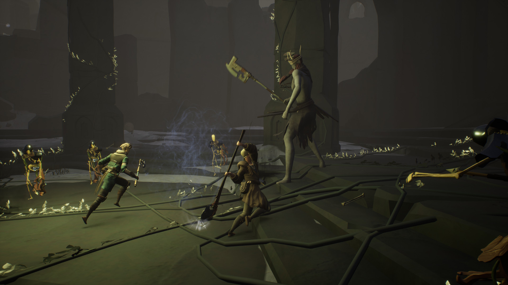 A group fights armed enemies in a dimly lit chamber.