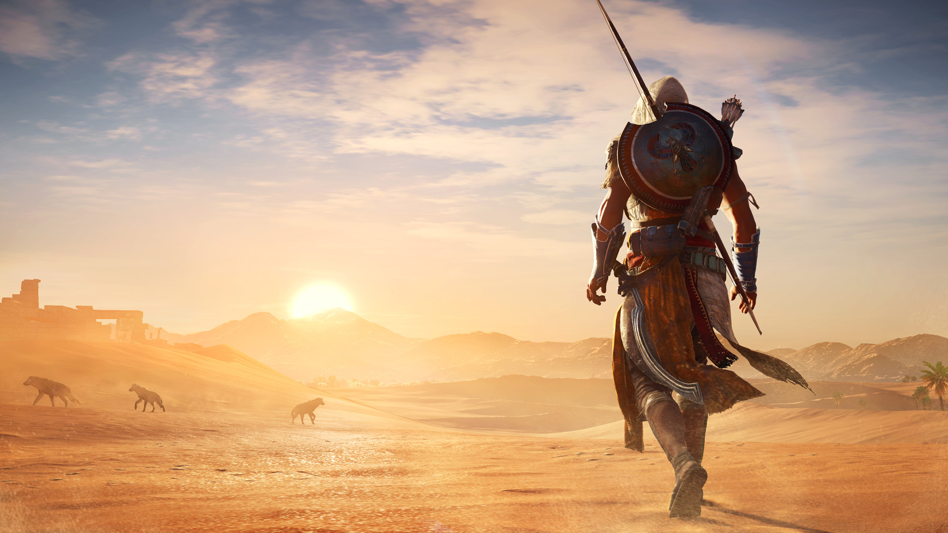 Bayek crosses a sunlit desert with weapons on his back.