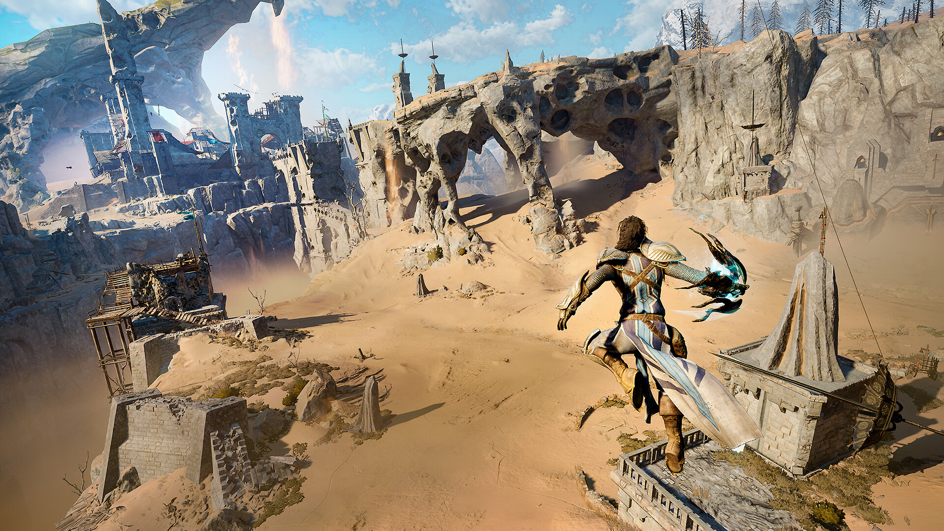 An armoured figure crosses ruined structures in a sandy landscape.