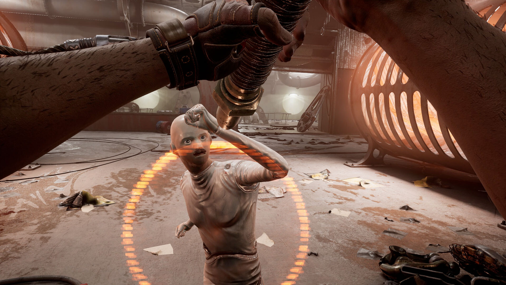 A hostile figure approaches inside a damaged facility.