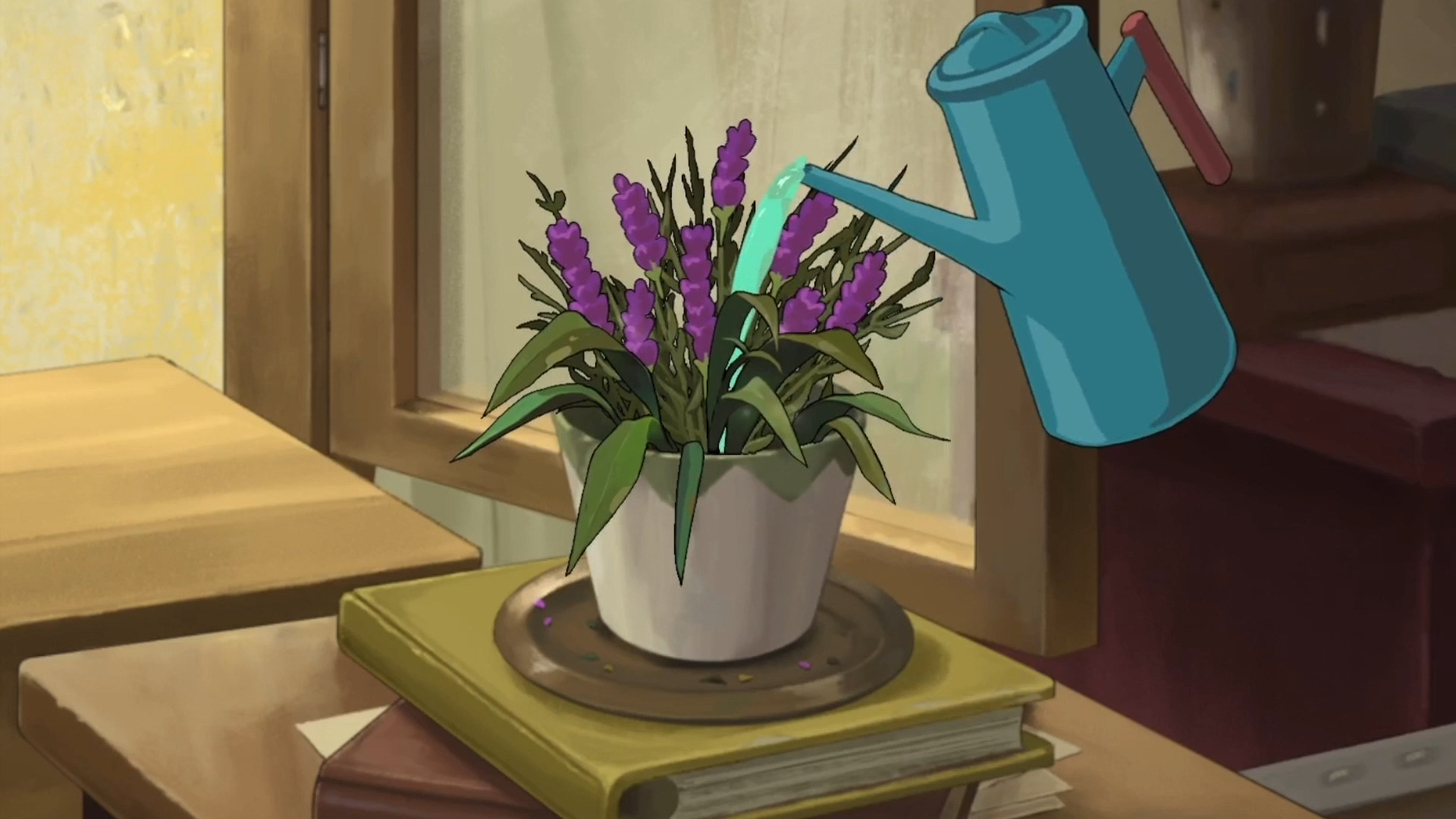 A blue watering can hangs above a pot of flowers.