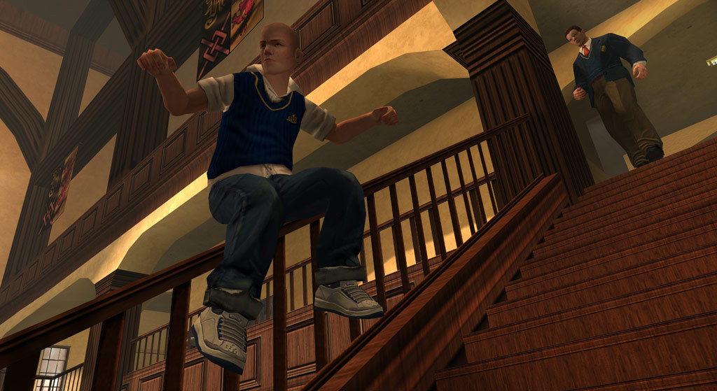 A student rides a skateboard inside a school building.
