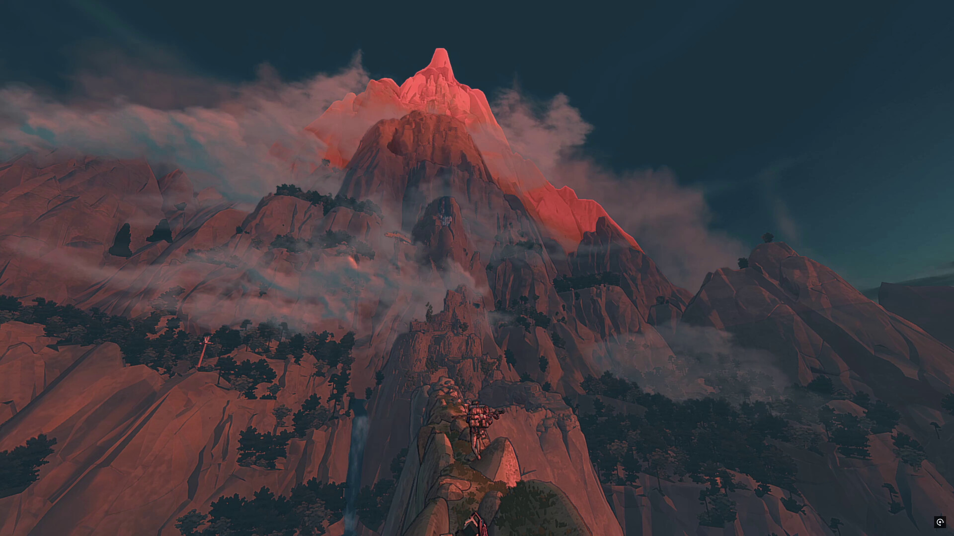 A red-lit mountain peak rises above the surrounding range.