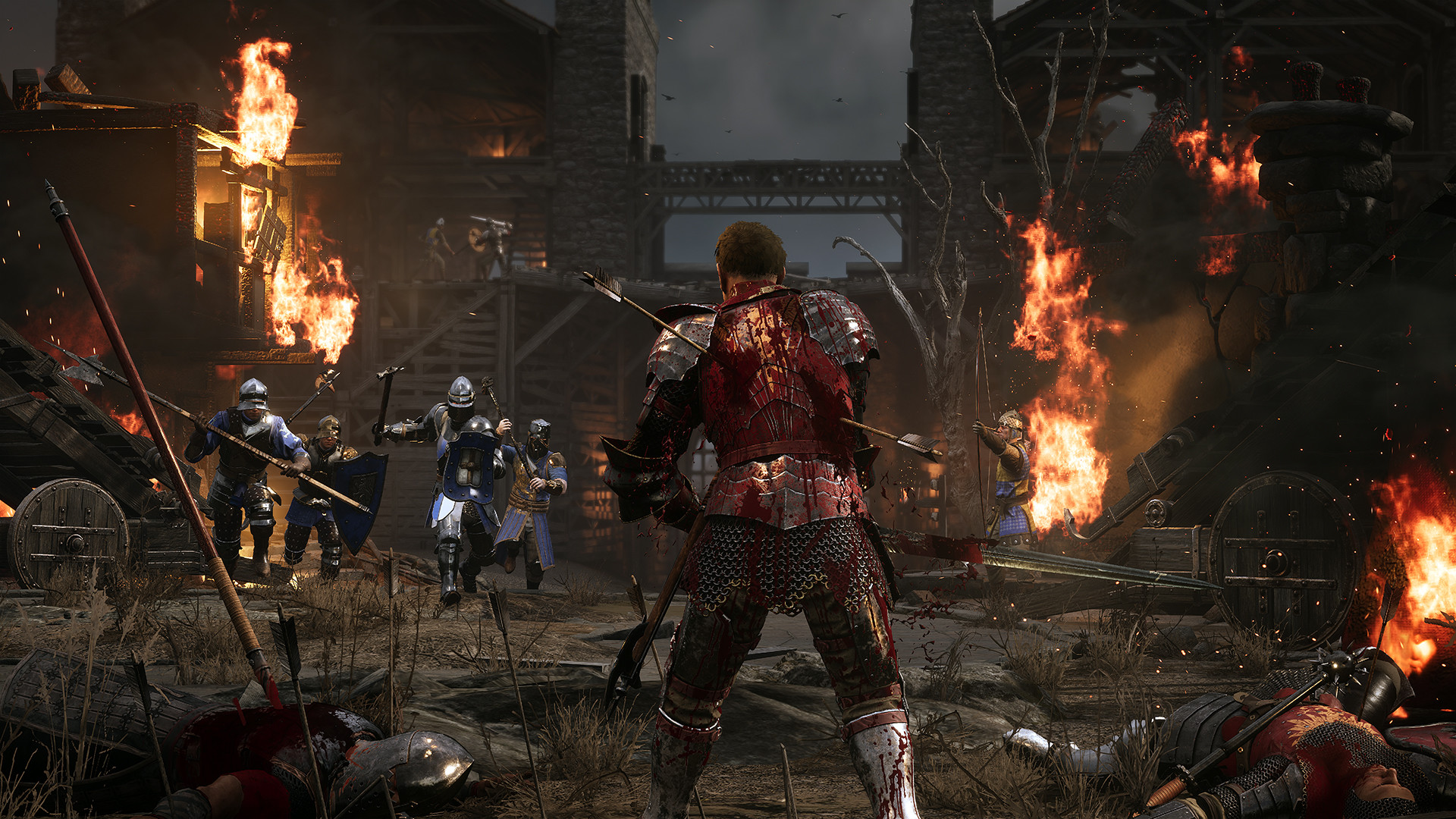 A fighter faces opposing soldiers amid a burning settlement.