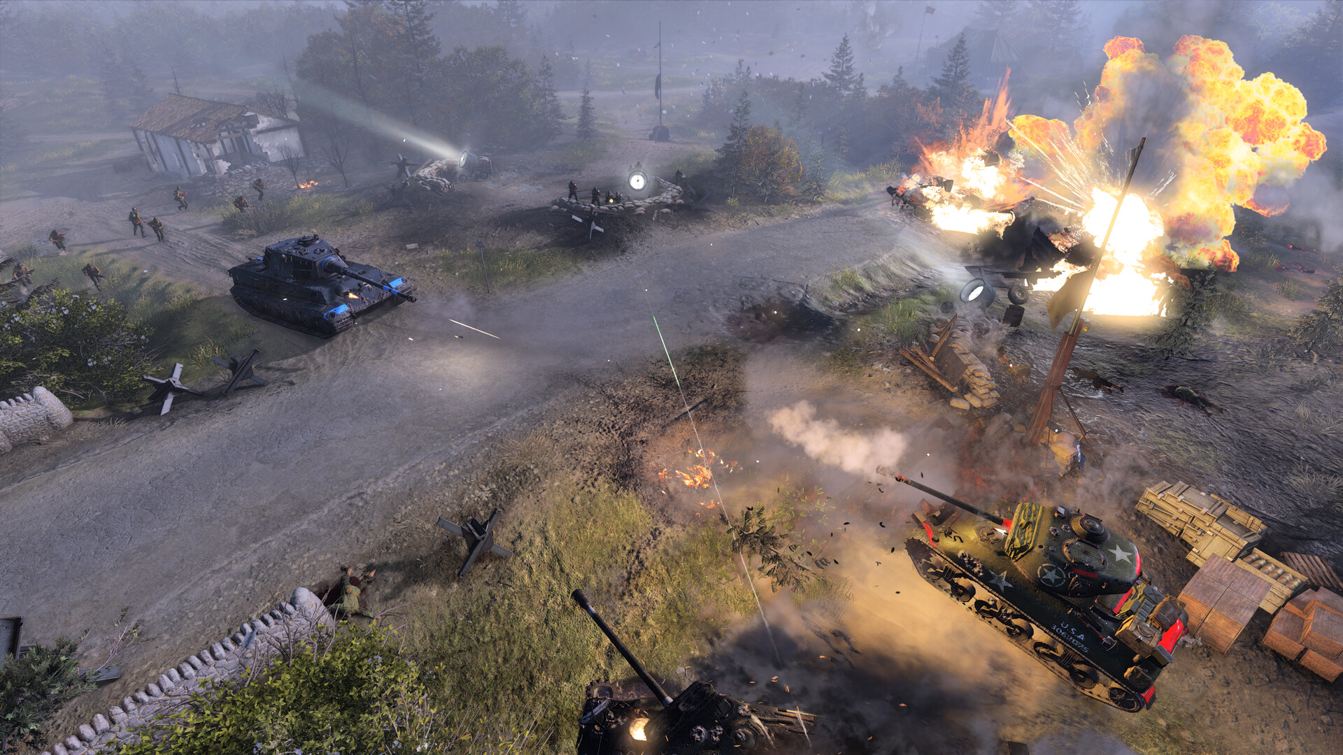 Armoured vehicles fight amid explosions on a battlefield.