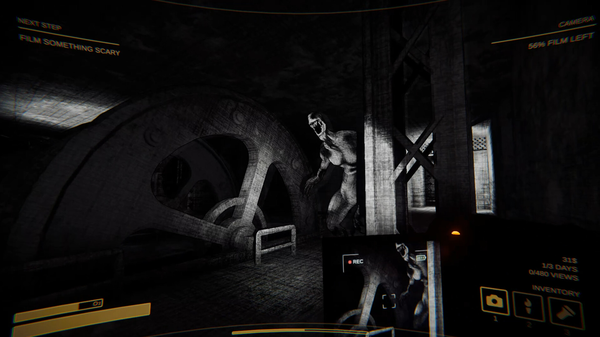 A figure appears in a dark room through the camera viewfinder.