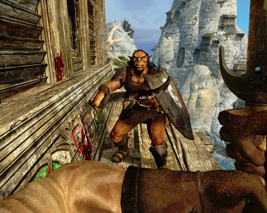 An orc confronts Sareth on a narrow wooden walkway.