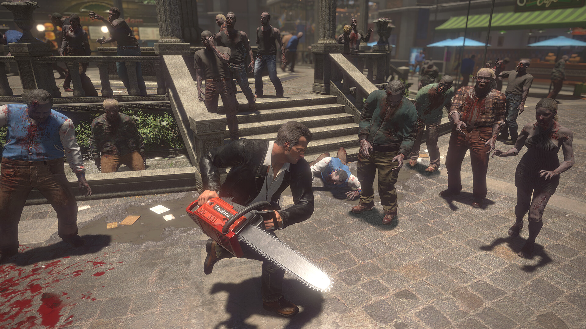 Frank swings a chainsaw as zombies approach.