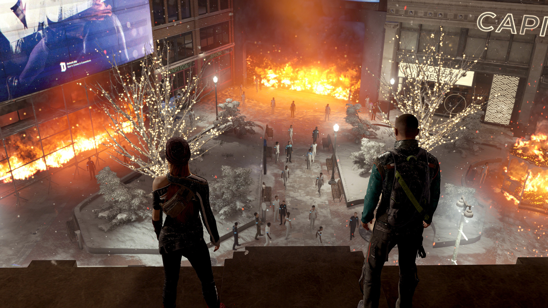 Two figures overlook a street confrontation at night.