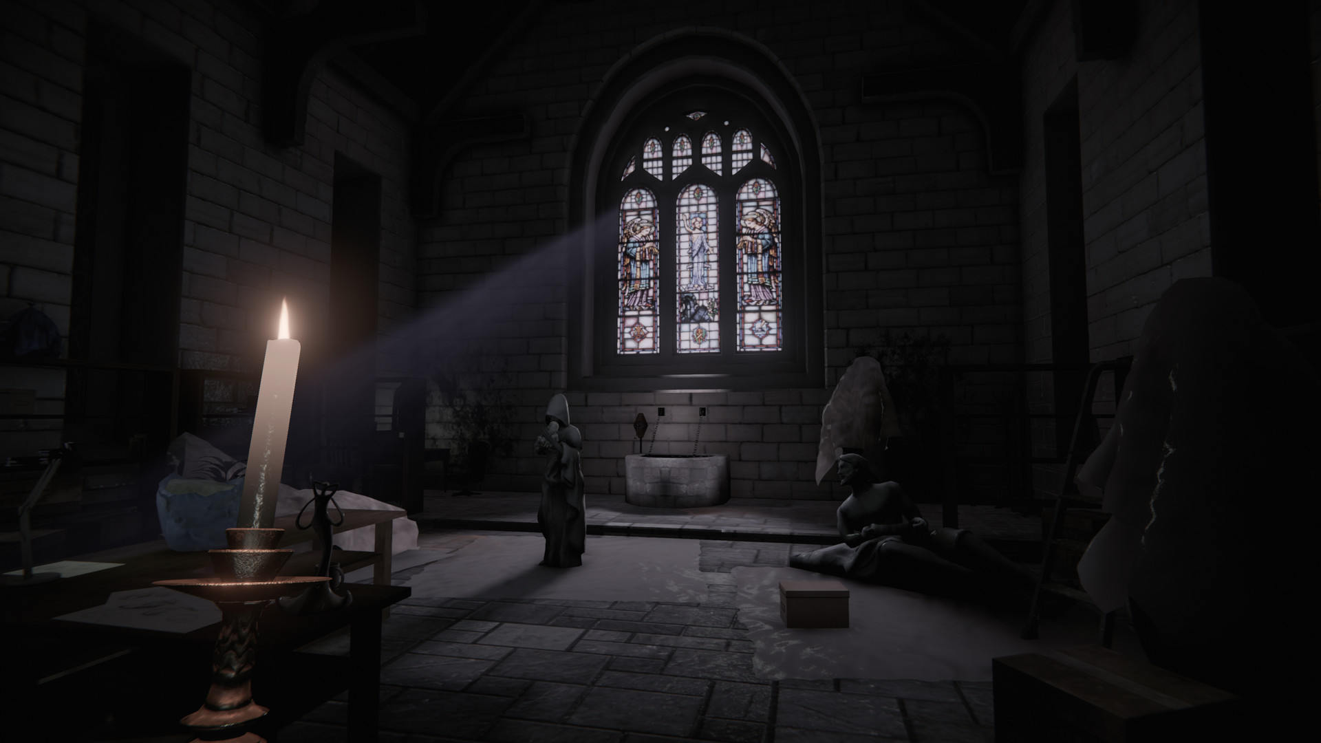 Light enters a stone room through a stained-glass window.