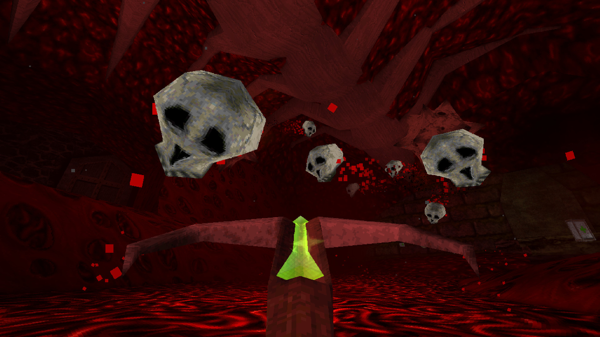 Floating skulls approach the player in a red cavern.
