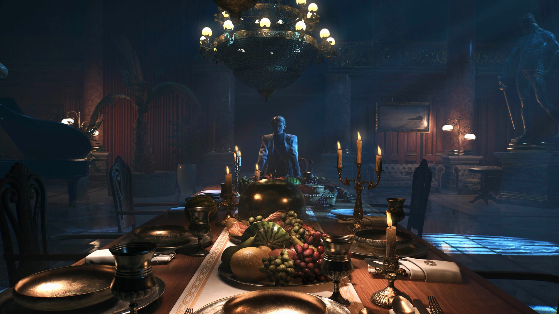 A figure stands beyond a candlelit dining table in a dark hall.