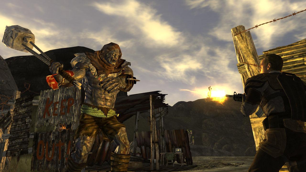 A wasteland fighter faces an armored creature outside a roadside settlement.