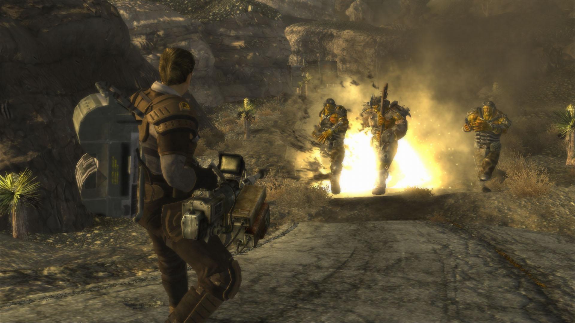 A survivor approaches armed figures near a tunnel entrance in the Mojave.
