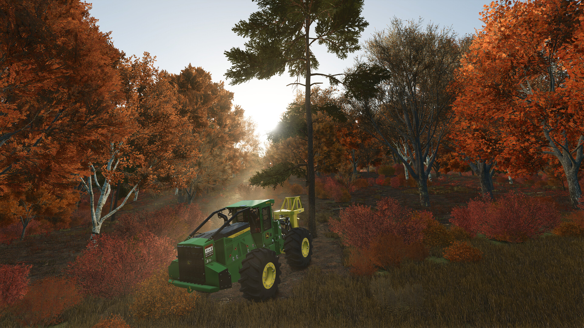 A forestry vehicle works among trees in an autumn landscape.