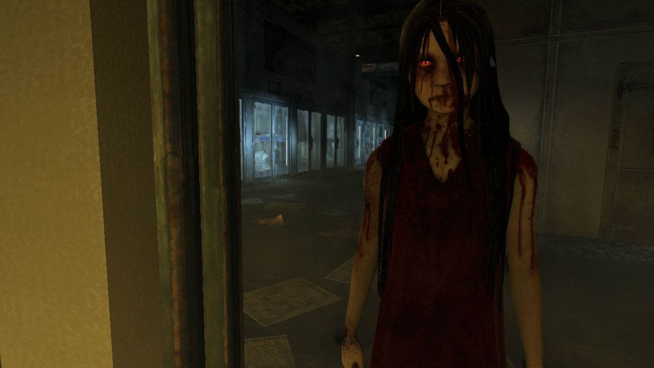 Alma stands in a dim corridor.
