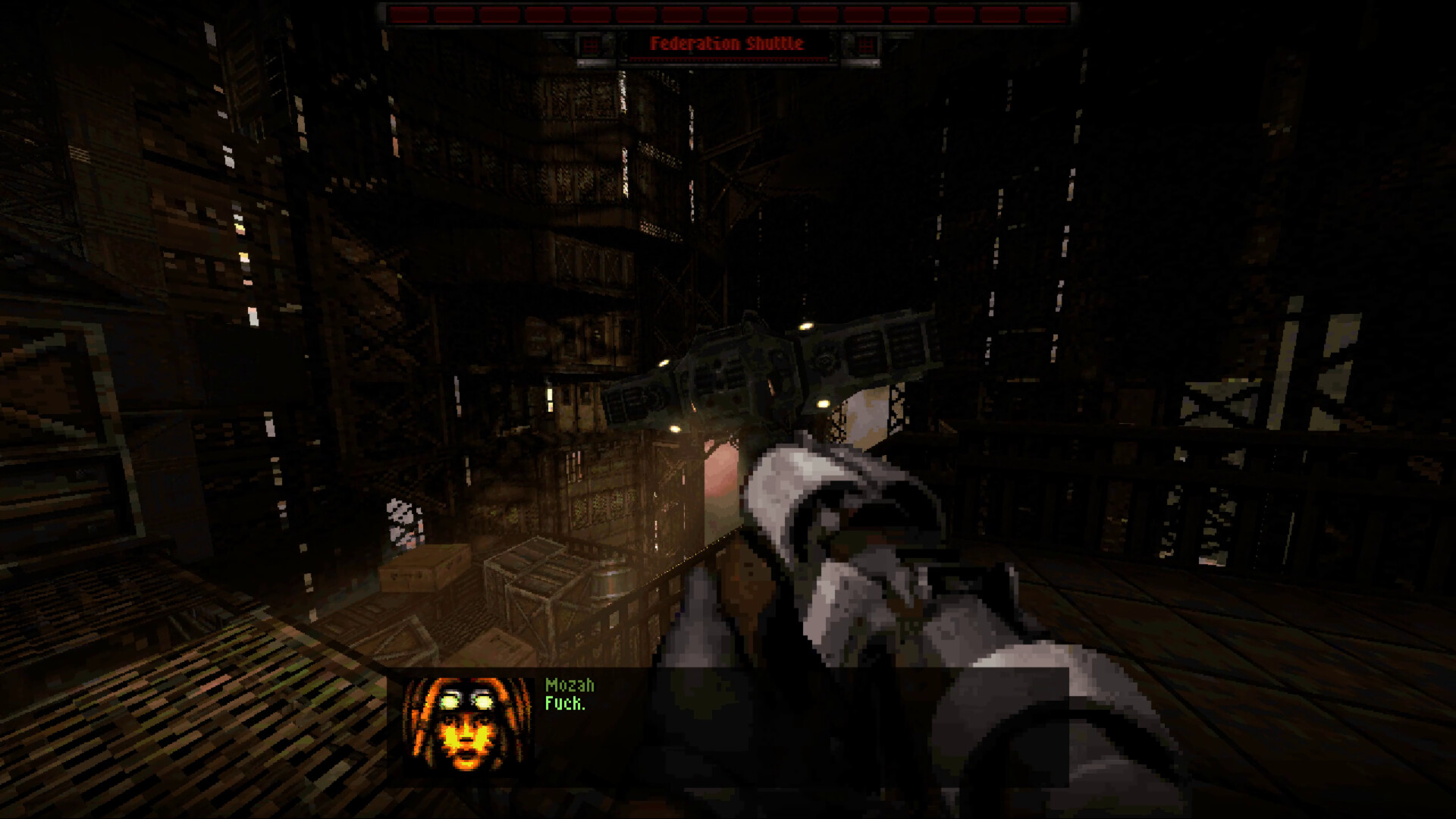 The player approaches stacked crates in a dark industrial space.