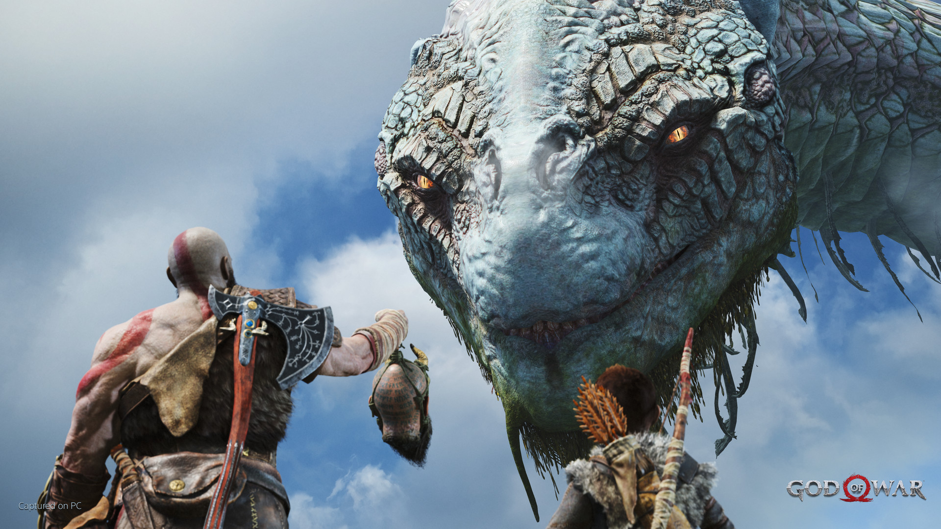 Kratos and Atreus face the enormous World Serpent.