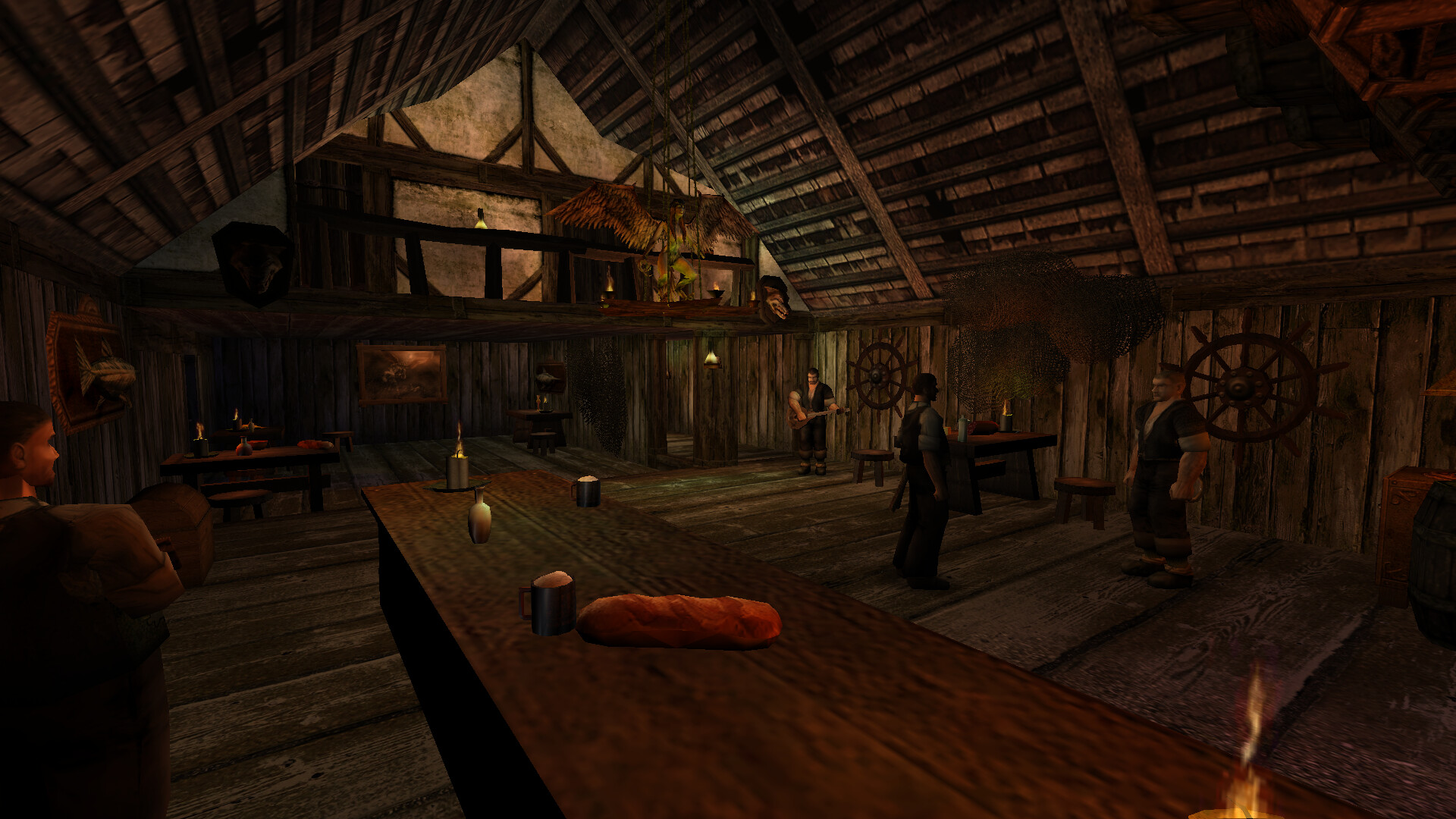 Residents gather inside a timber-built hall.
