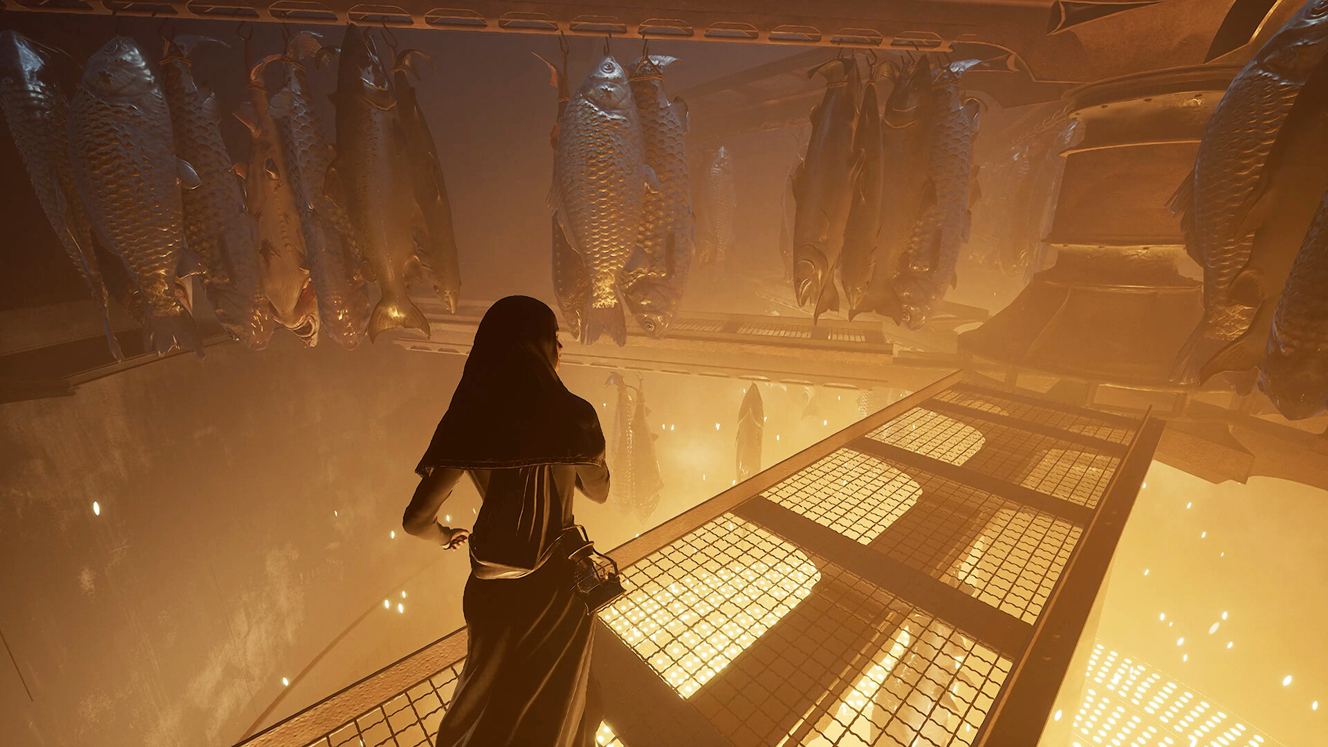 Indika crosses a chamber beneath hanging fish.