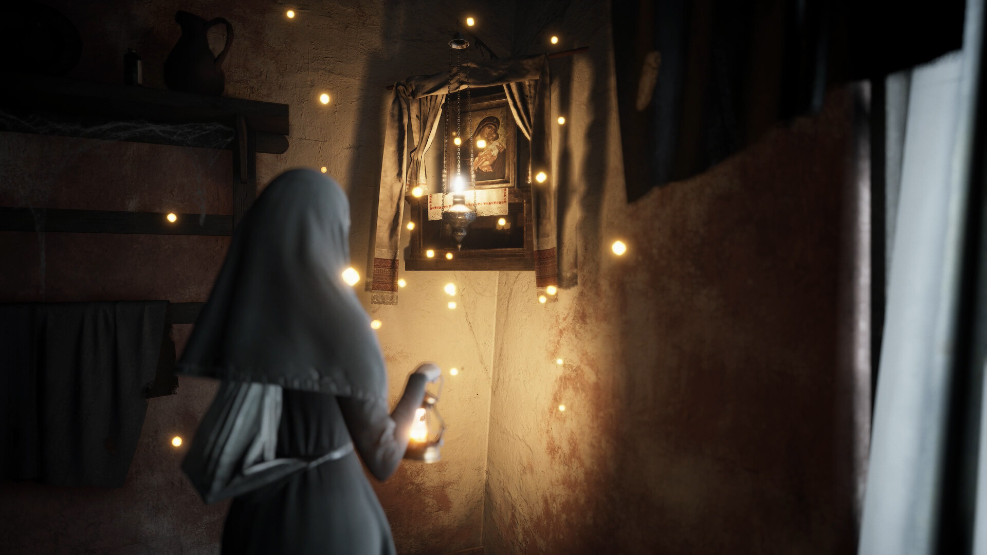 Indika examines a religious image on a wall.
