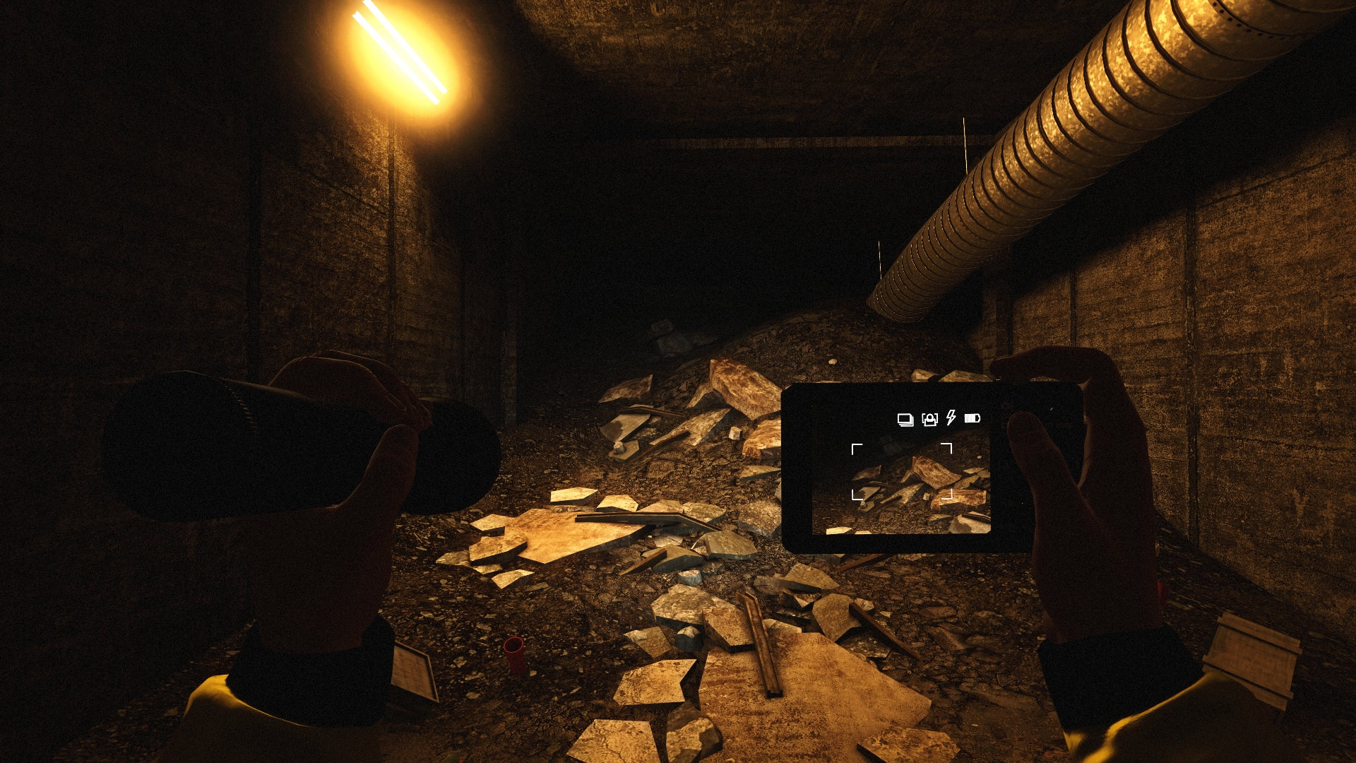 A camera documents damage inside a dim utility tunnel.