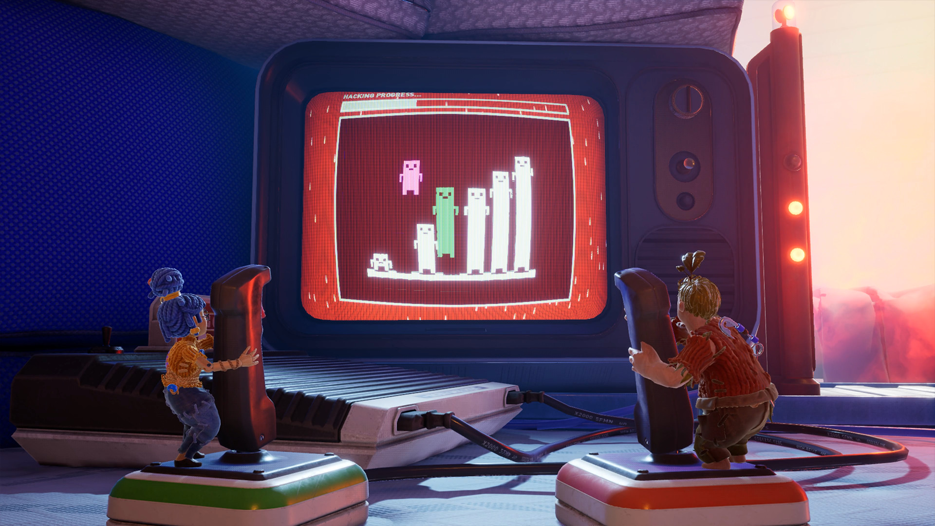Cody and May use separate joysticks beside a large arcade screen.