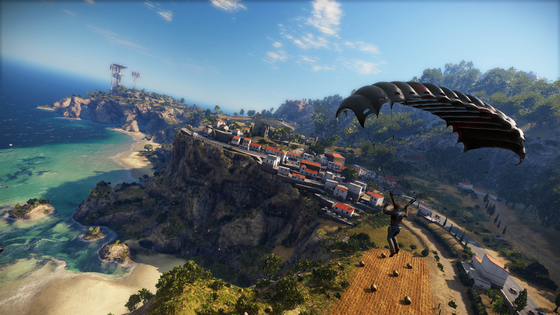 Rico parachutes above a coastal settlement in Medici.