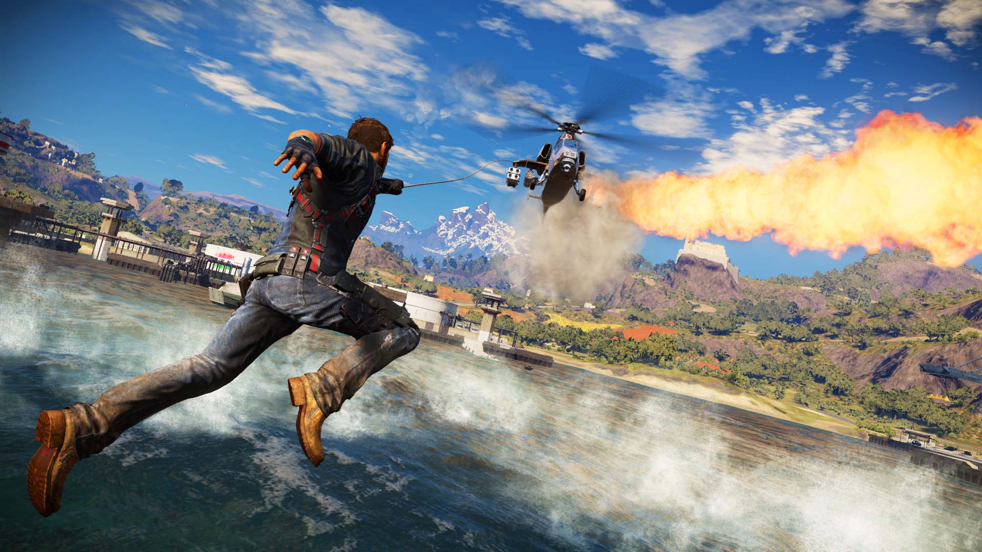 Rico leaps toward a helicopter as fire spreads along the coast.