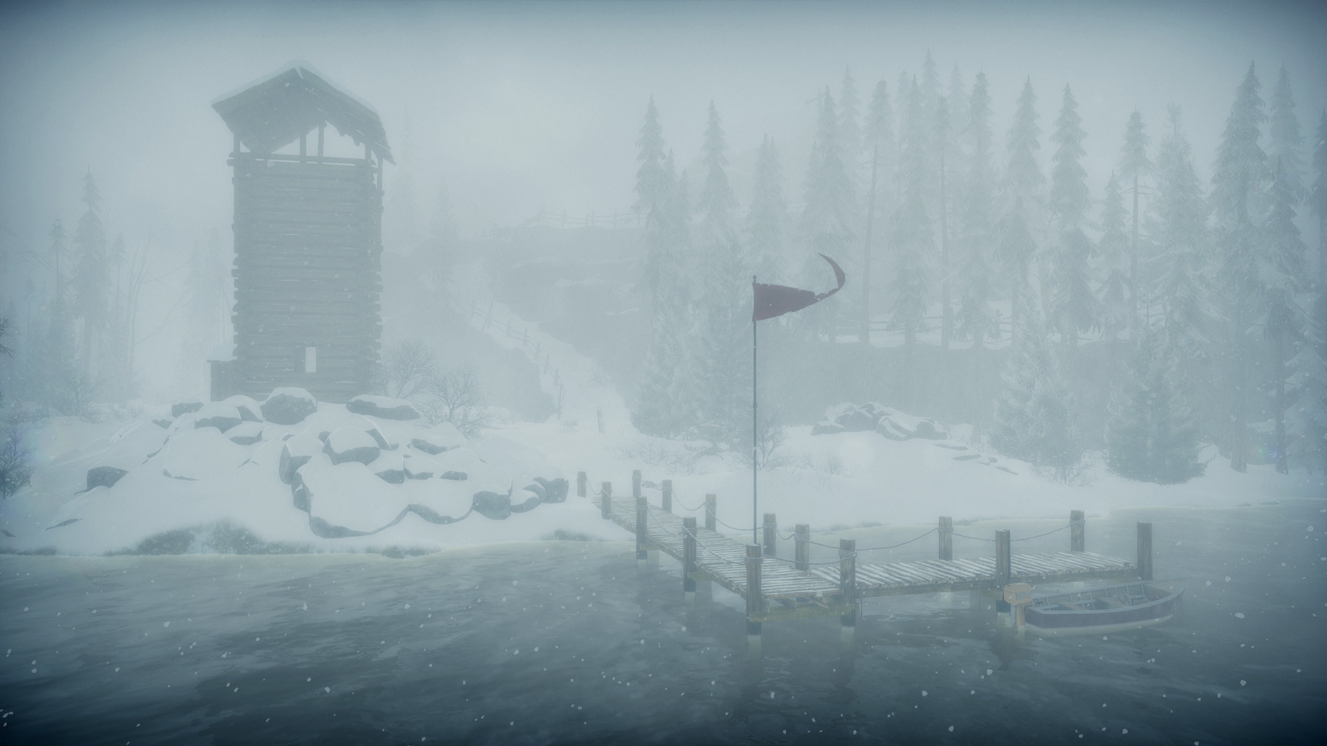A watchtower stands beside a snow-covered path.