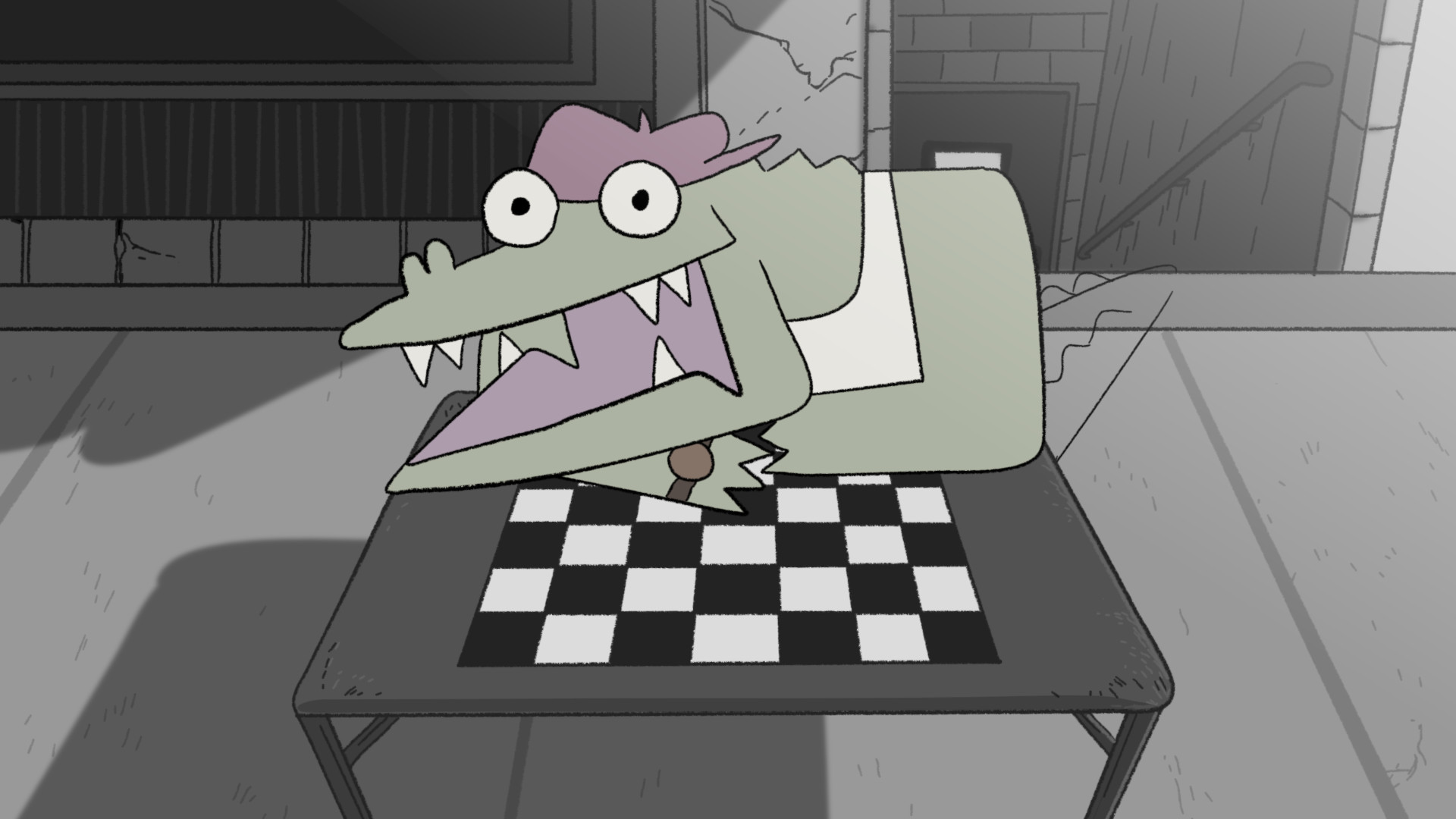 A long-jawed alligator sits behind a checkerboard table.