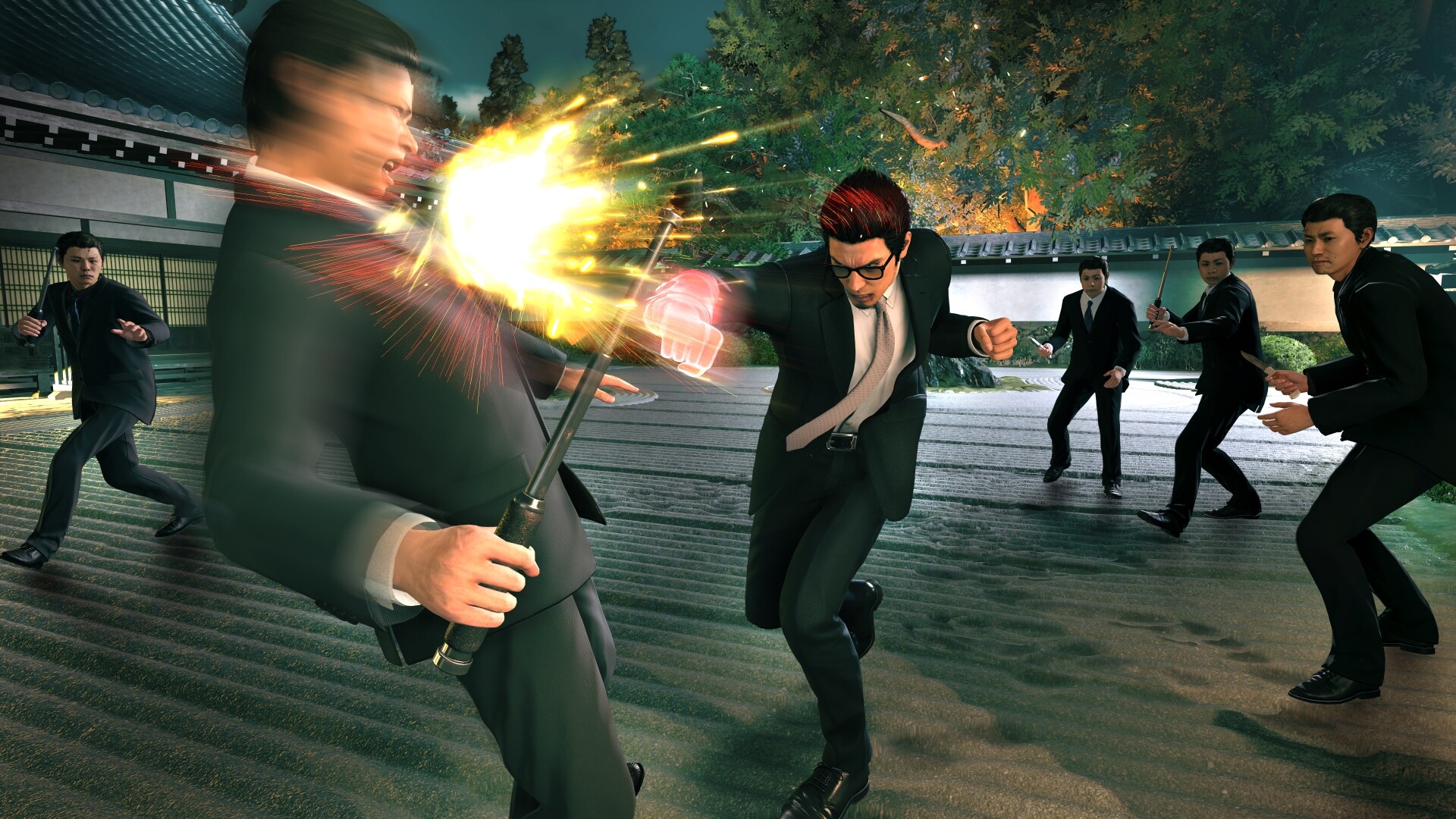 Kazuma Kiryu strikes an attacker surrounded by other men in a garden.