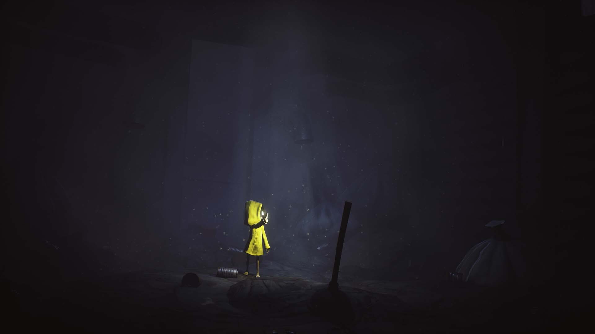 Six in a yellow raincoat stands in a dark room aboard the Maw.