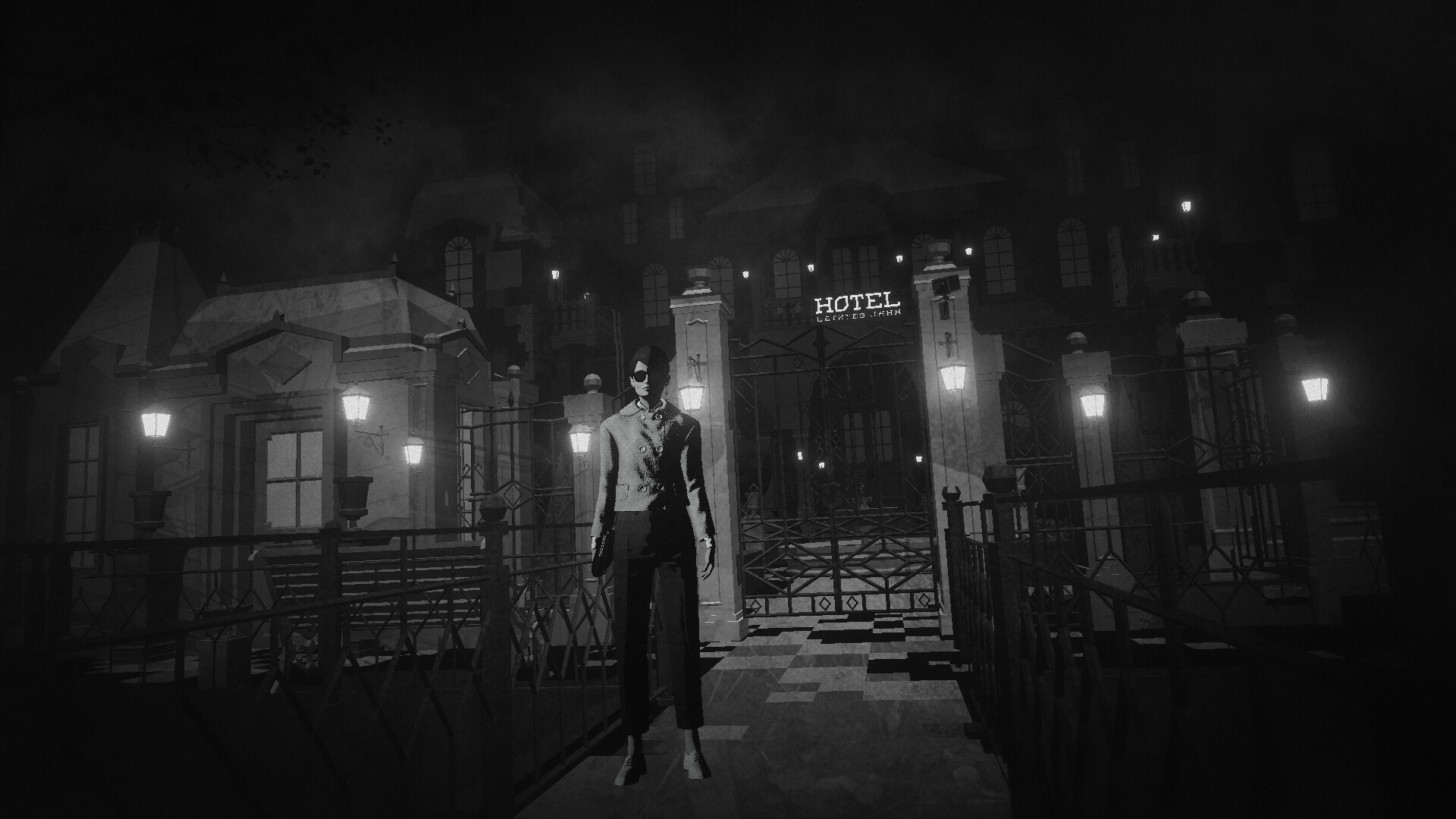 The woman stands outside the black-and-white hotel entrance.