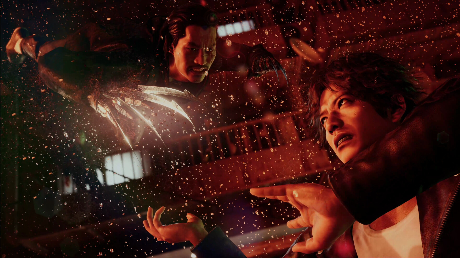 Yagami defends against a close-range strike.