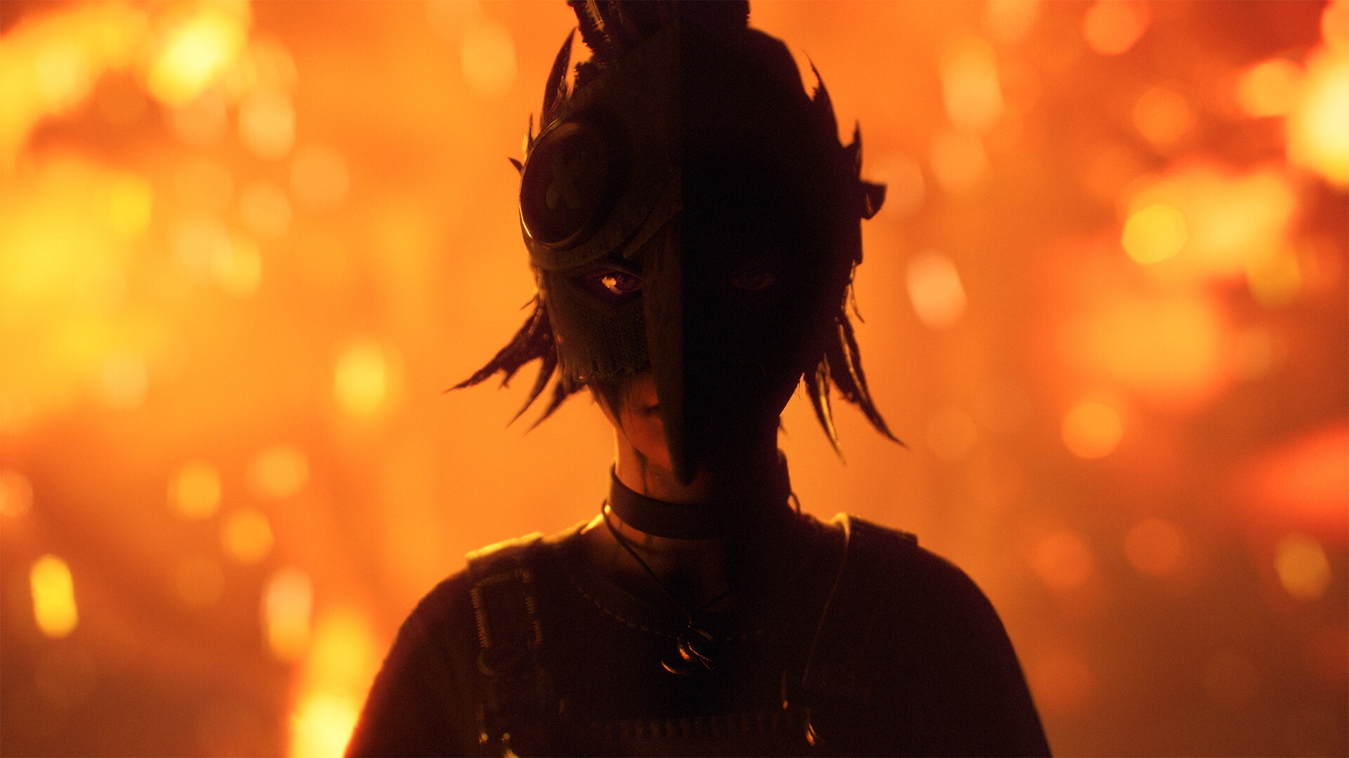 A young woman is silhouetted against orange firelight.