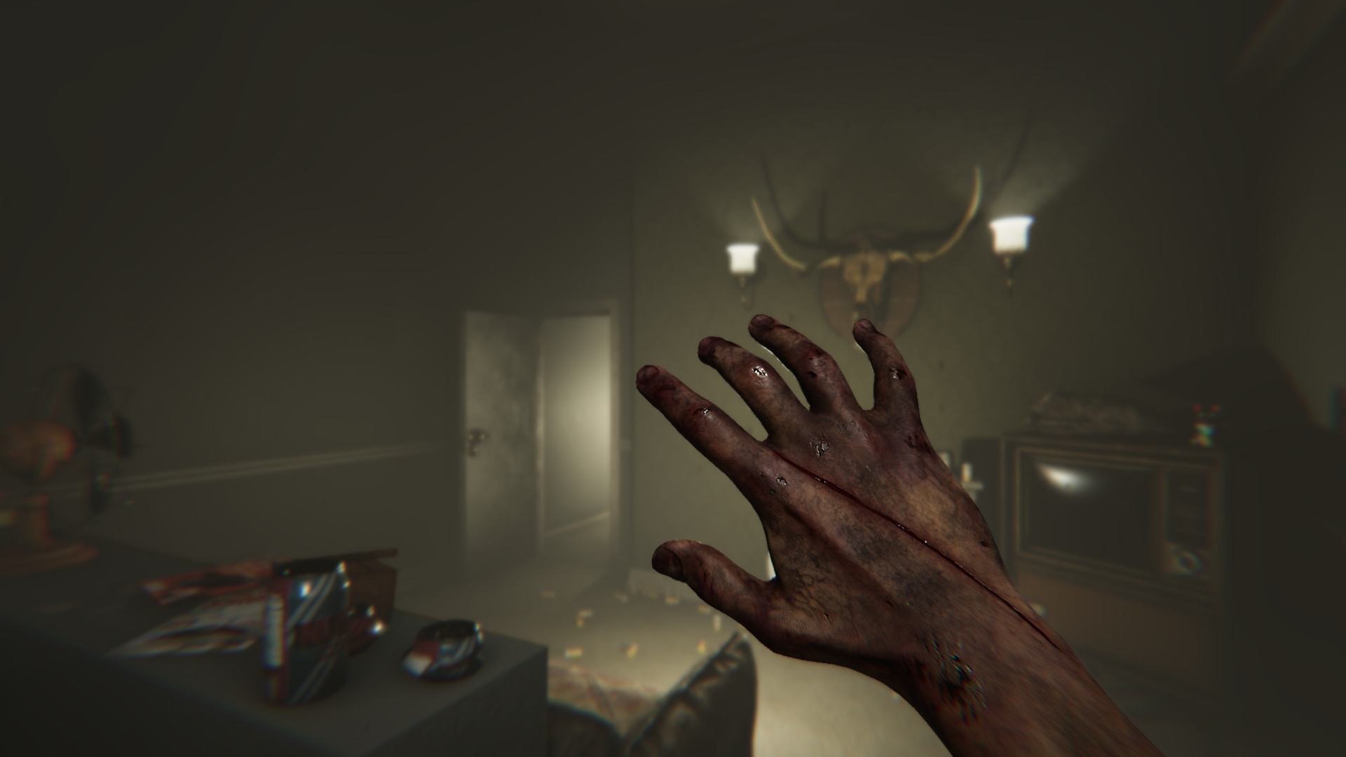 A bloodied hand reaches into a dim room.