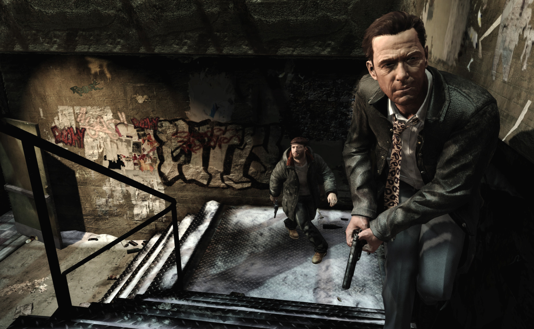 Armed men move through a graffitied stairwell.
