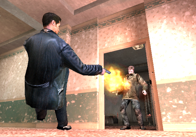 Max fires at an armed opponent in a corridor.