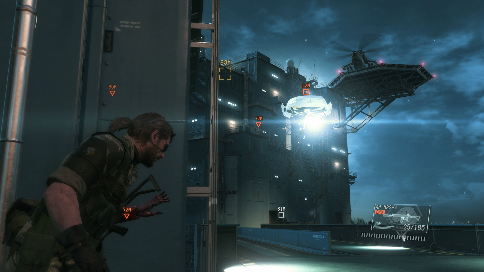 Snake takes cover near a guarded industrial platform.