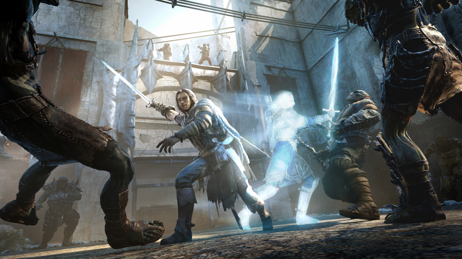 Talion fights Orcs as a wraithlike figure appears beside him.