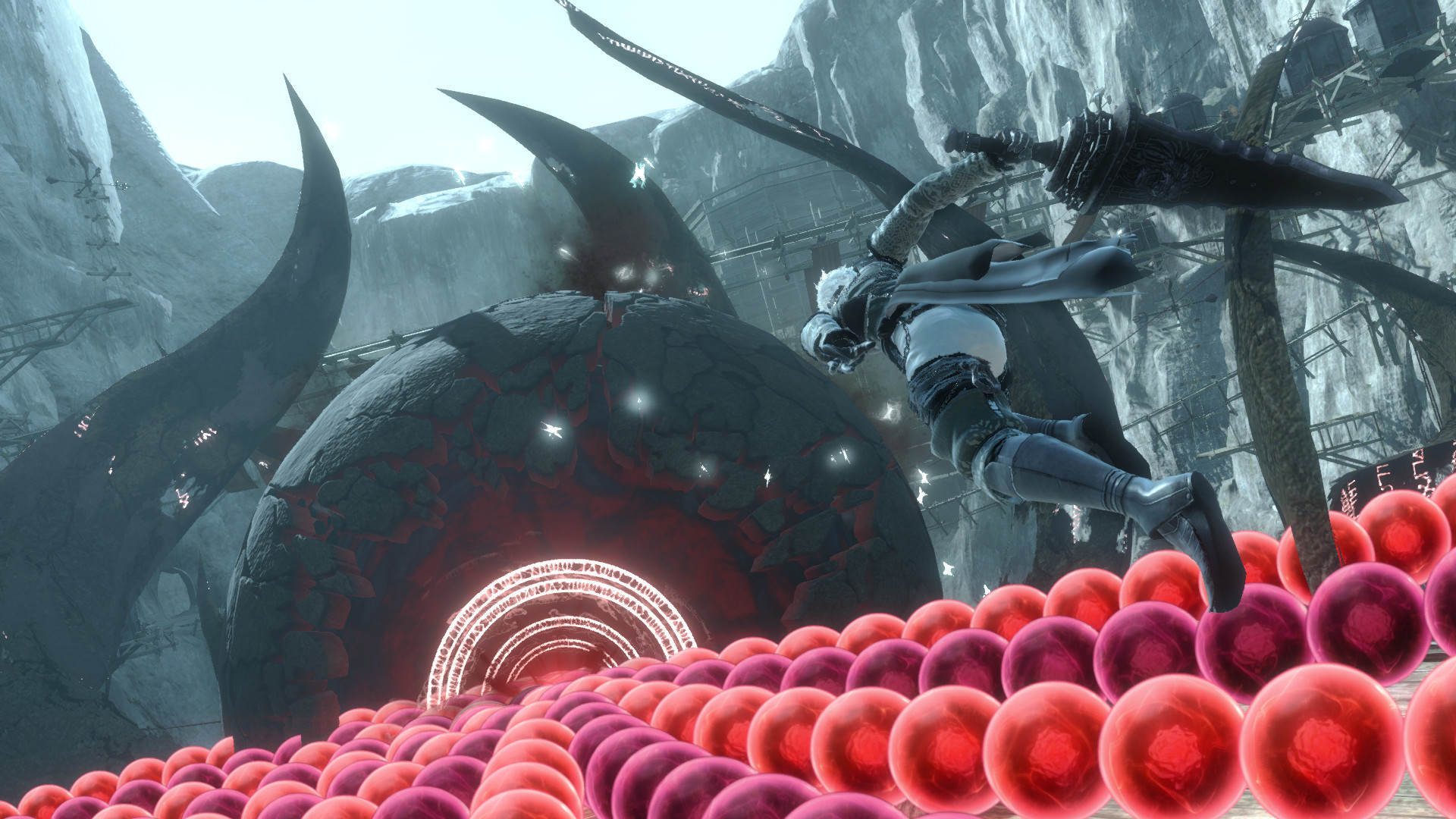 The protagonist fights a large foe amid a field of red projectiles.