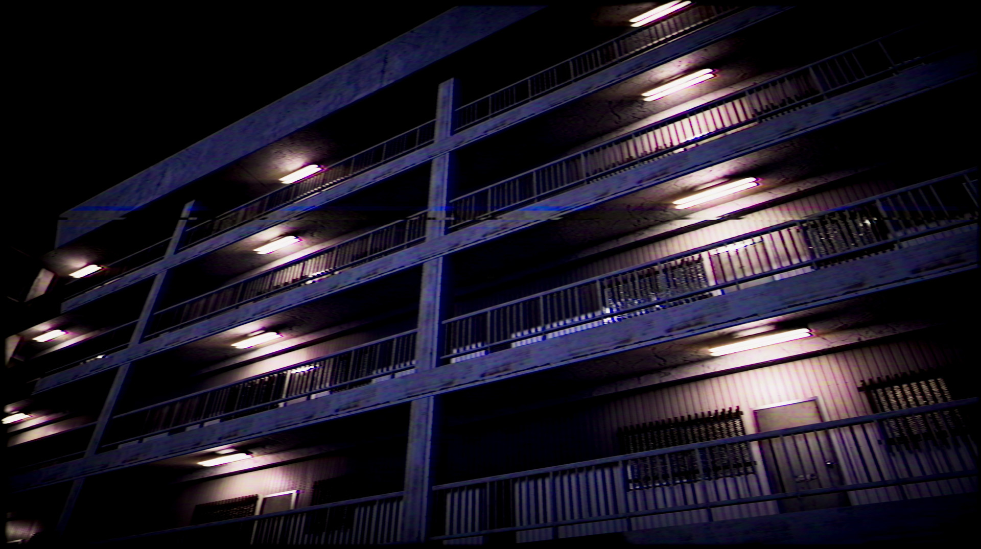 The lit balconies of an apartment building rise into the night.