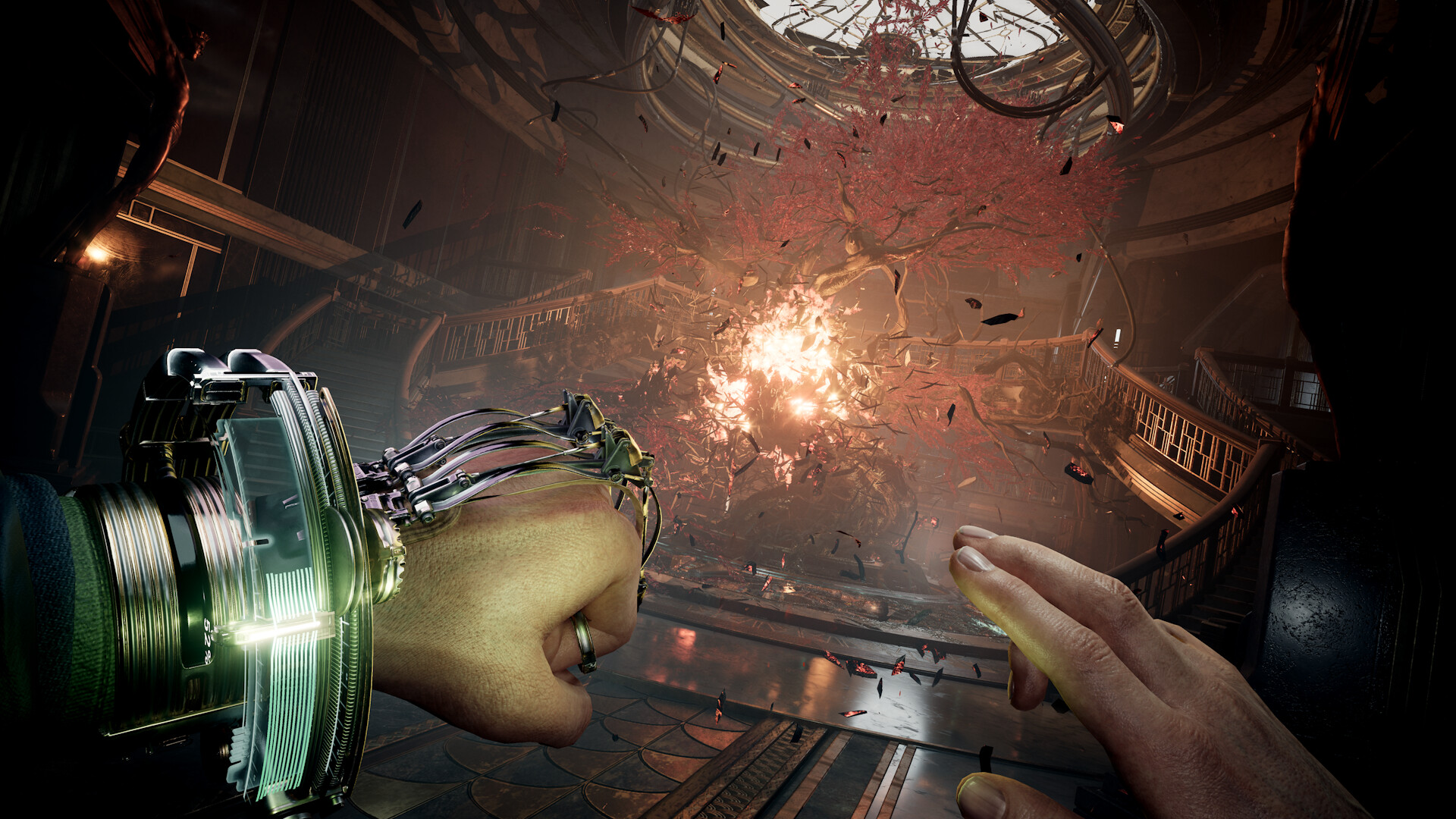An investigator uses a wrist device while looking into a damaged chamber.