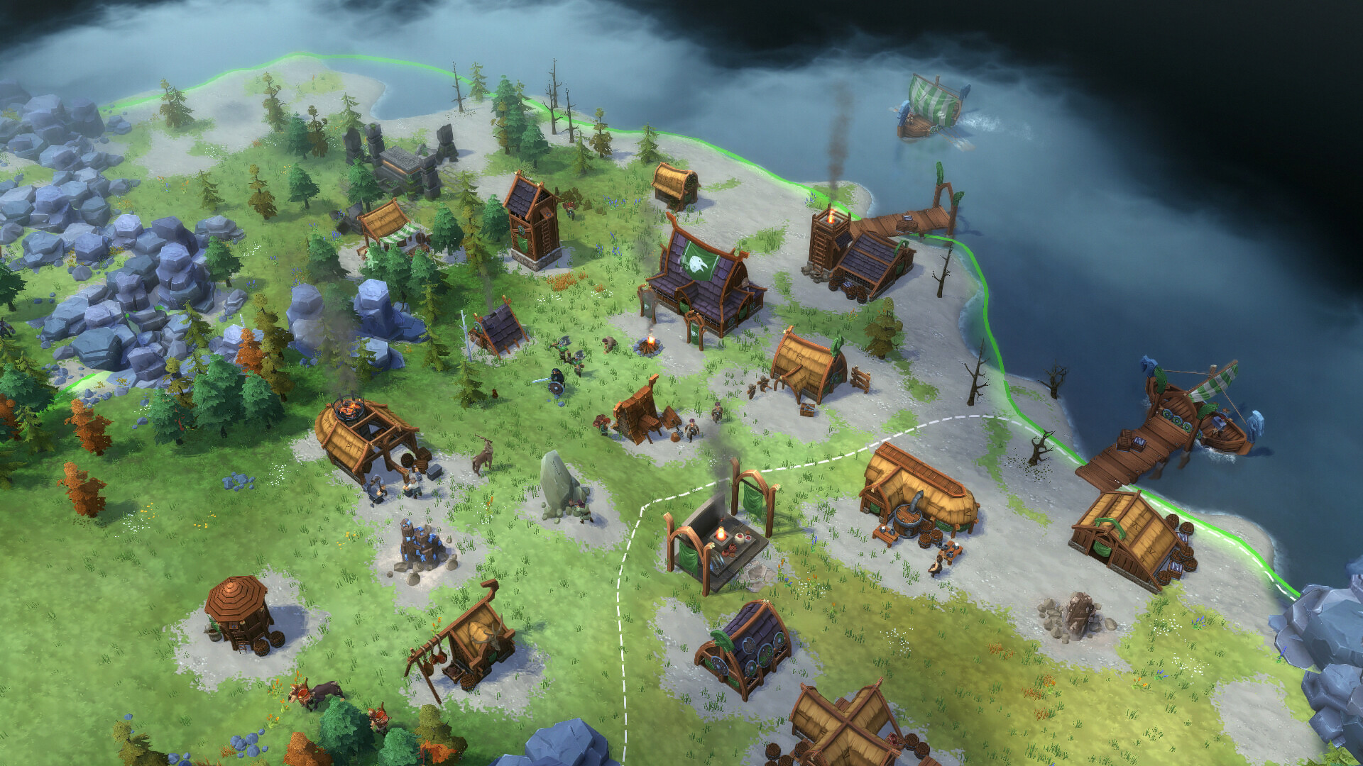 A coastal clan settlement spreads through a green region.
