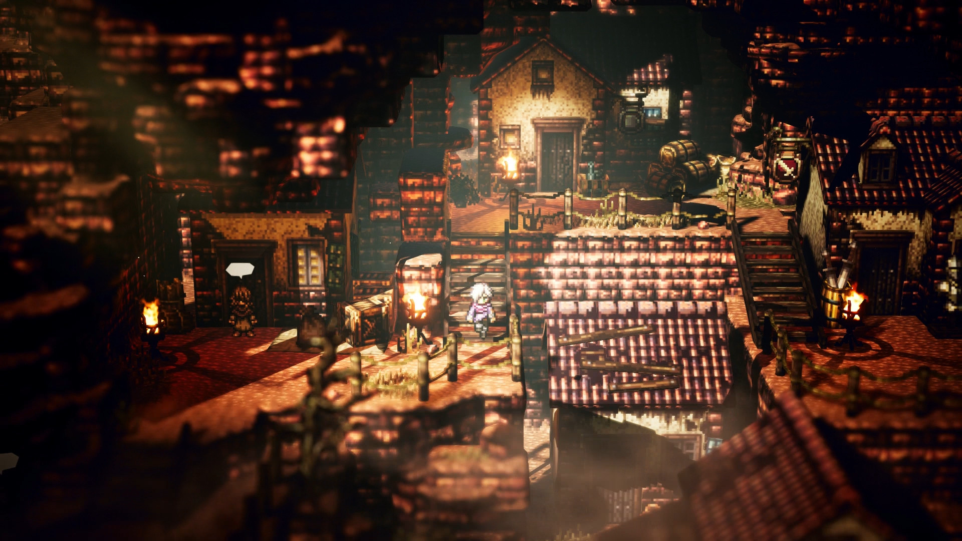 A lantern-lit settlement glows at night.