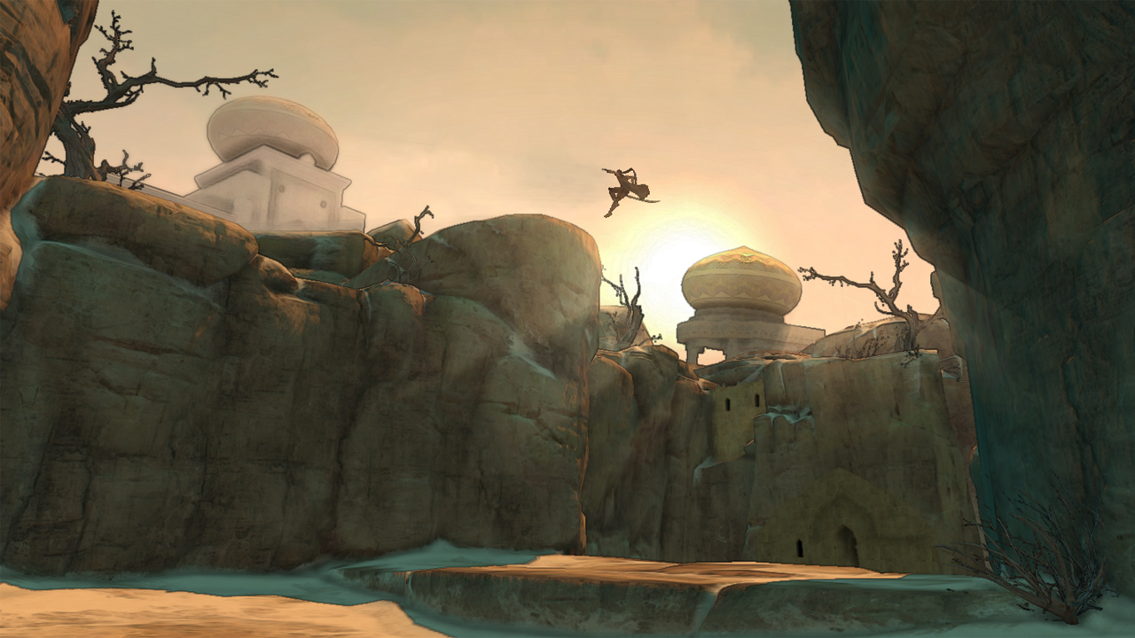The Prince leaps between rocky ledges in a desert landscape.
