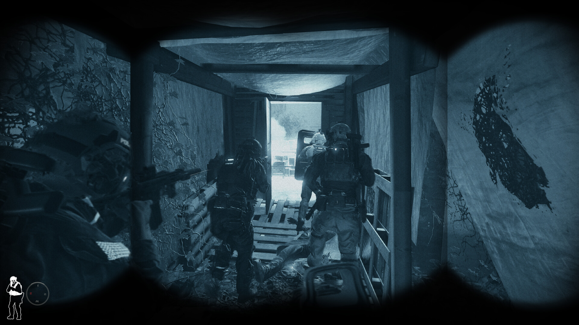 A tactical team moves through a damaged corridor toward daylight.